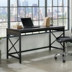 Sauder Foundry Road Engineered Wood/Metal 60x24 Table Desk In Carbon Oak 14 Sauder Foundry Road Engineered Wood/Metal 60x24 Table Desk In Carbon Oak -CYMAX Sales 2674459 3 L